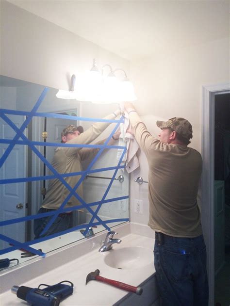 removing large bathroom mirrors